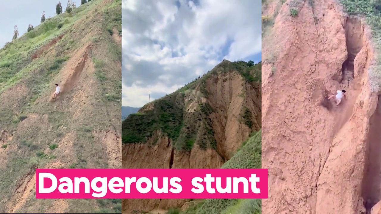 Watch: Chinese man's very risky parkour down steep hillside